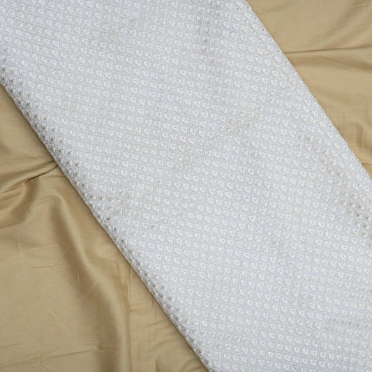All Over Golden Tikki Thread Work Embroidery On White Dyeable Upada Fabric