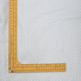 All Over Golden Tikki Thread Work Embroidery On White Dyeable Upada Fabric