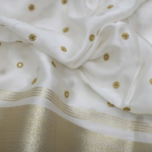Golden Buti Work Embroidery With Lagdi Pata Border On White Dyeable Gaji Silk Fabric