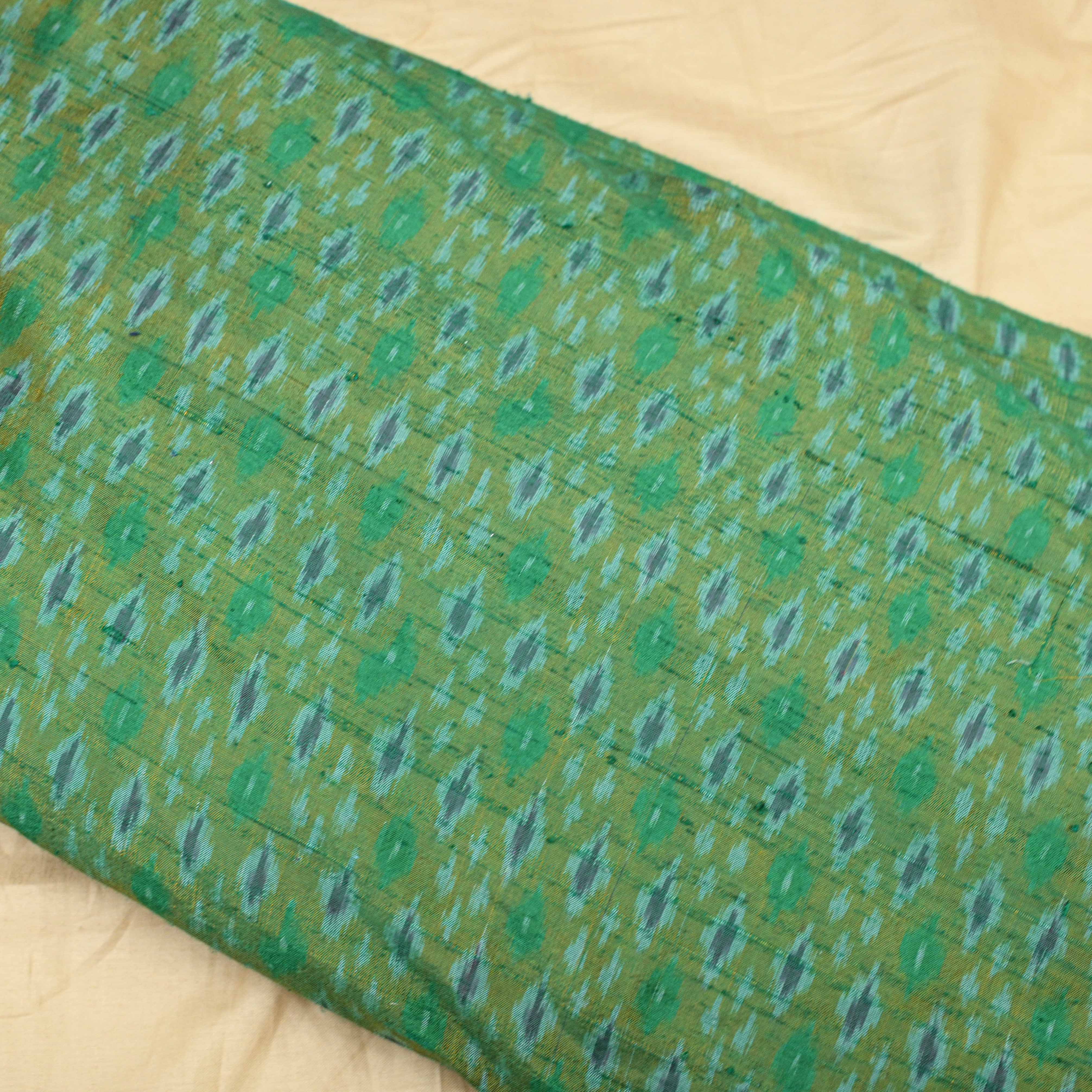 Mehandi Green Colour Pure Raw Silk Ikat Printed Fabric - Shree Om Fabrics