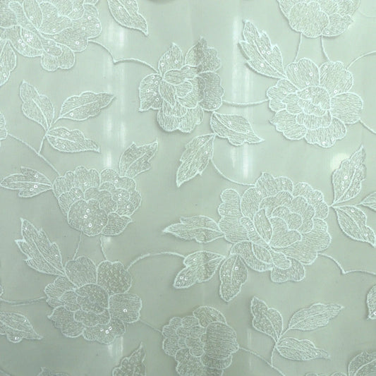 Floral Jaal Embroidery On White Dyeable Net Fabric