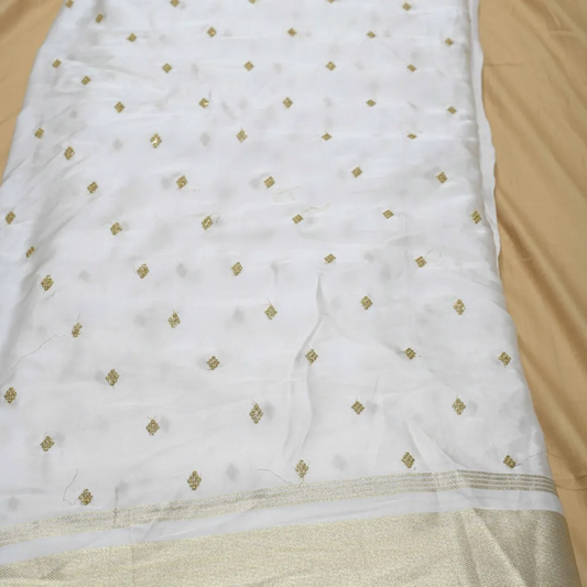 Golden Buti Work Embroidery With Lagdi Pata Border On White Dyeable Gaji Silk Fabric