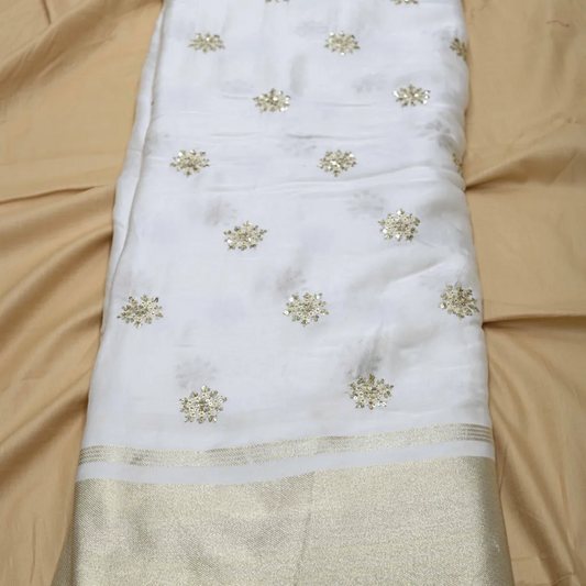 Golden Buti Work Embroidery With Lagdi Pata Border On White Dyeable Gaji Silk Fabric