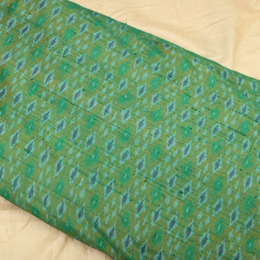 Mehandi Green Colour Pure Raw Silk Ikat Printed Fabric - Shree Om Fabrics